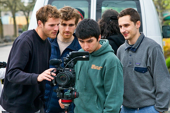students looking at a camera